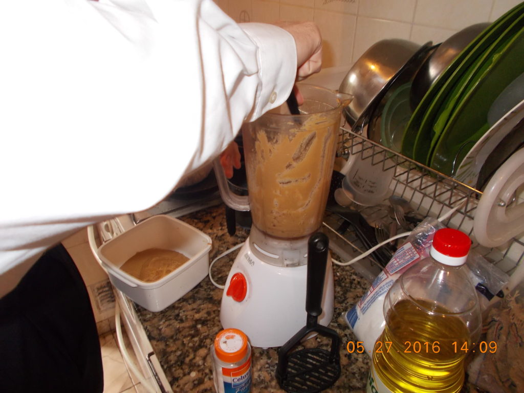 Elder LeBaron making homemade peanut butter.